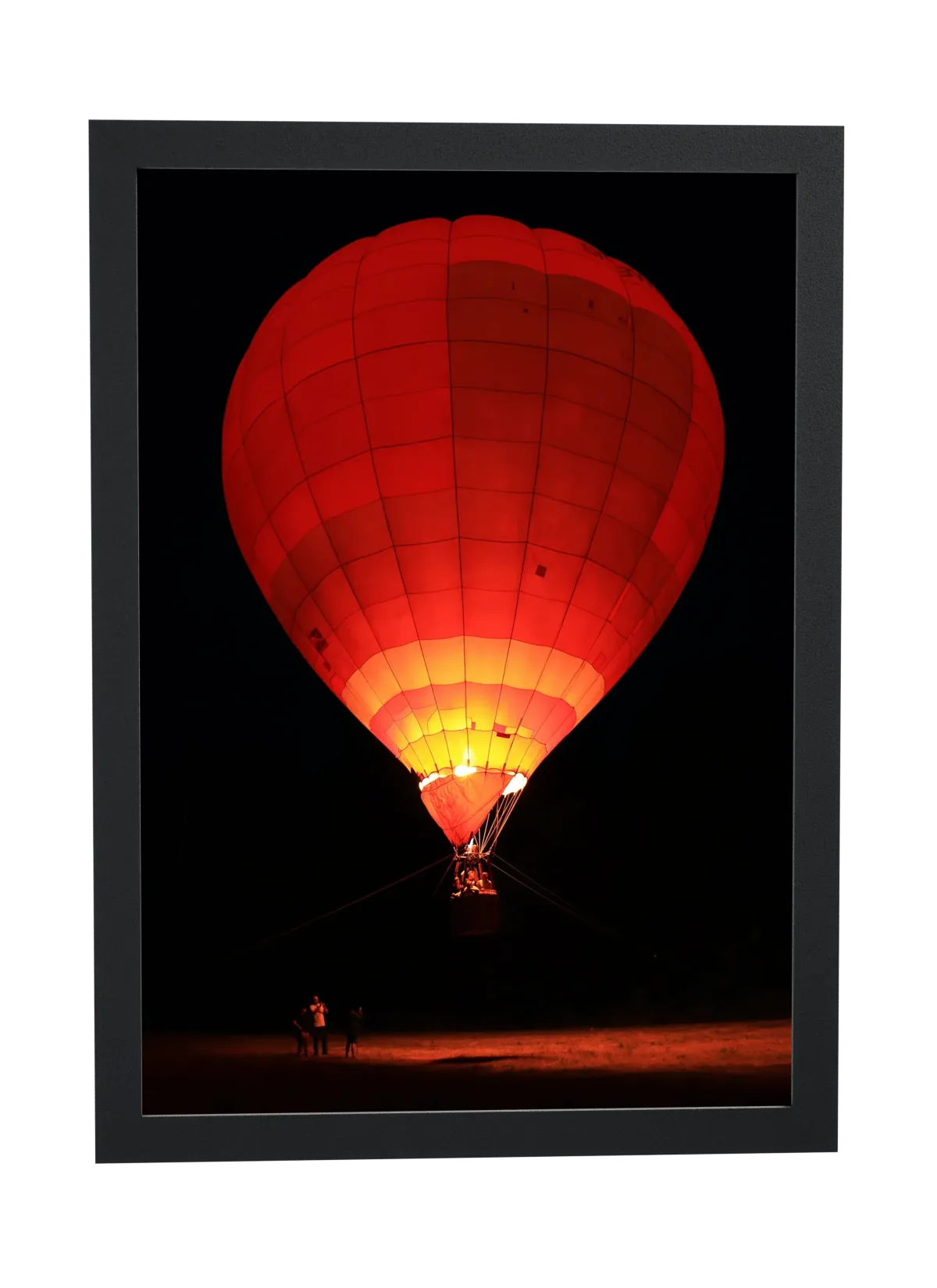 Balão vermelho iluminado à noite